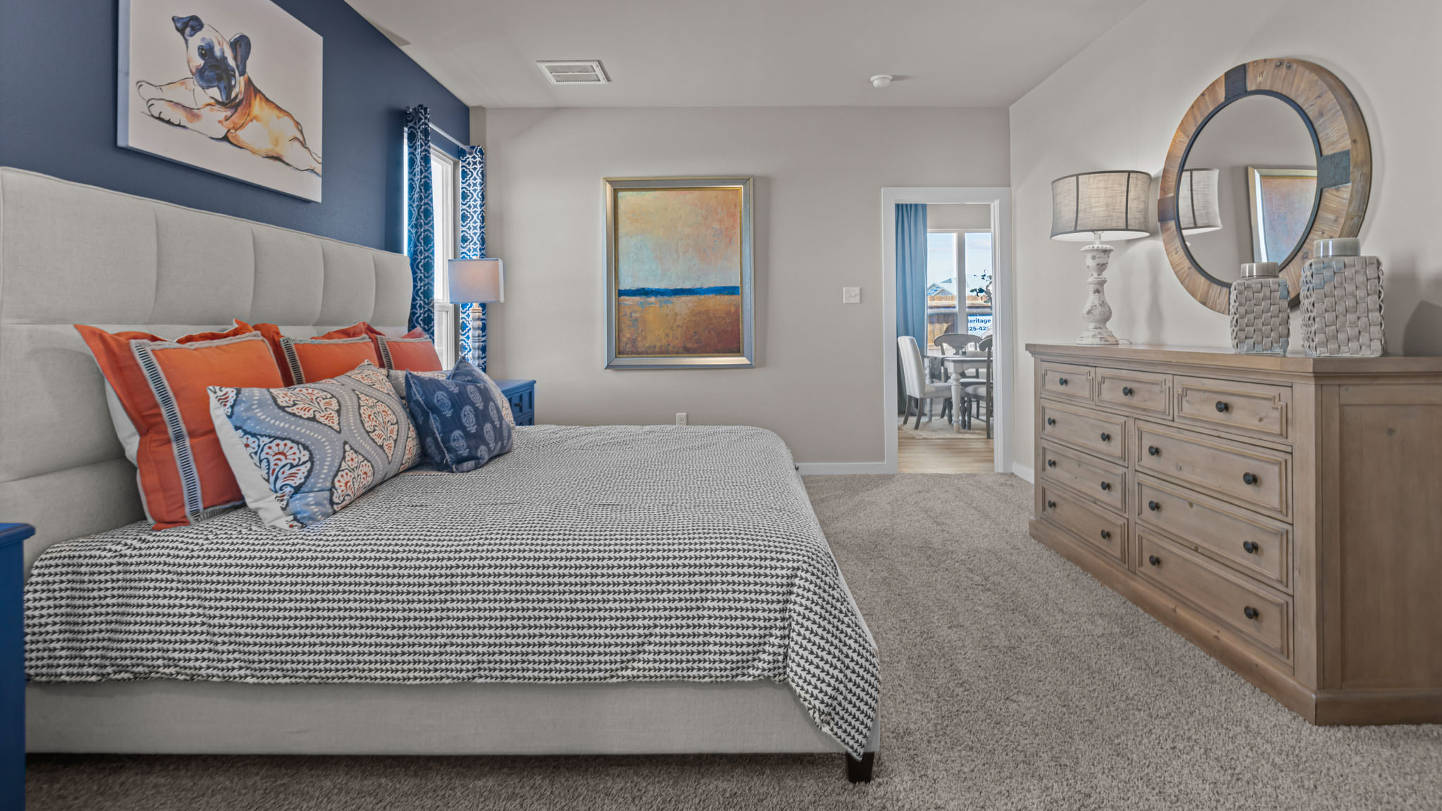 Primary bedroom with private attached bathroom and walk-in closet