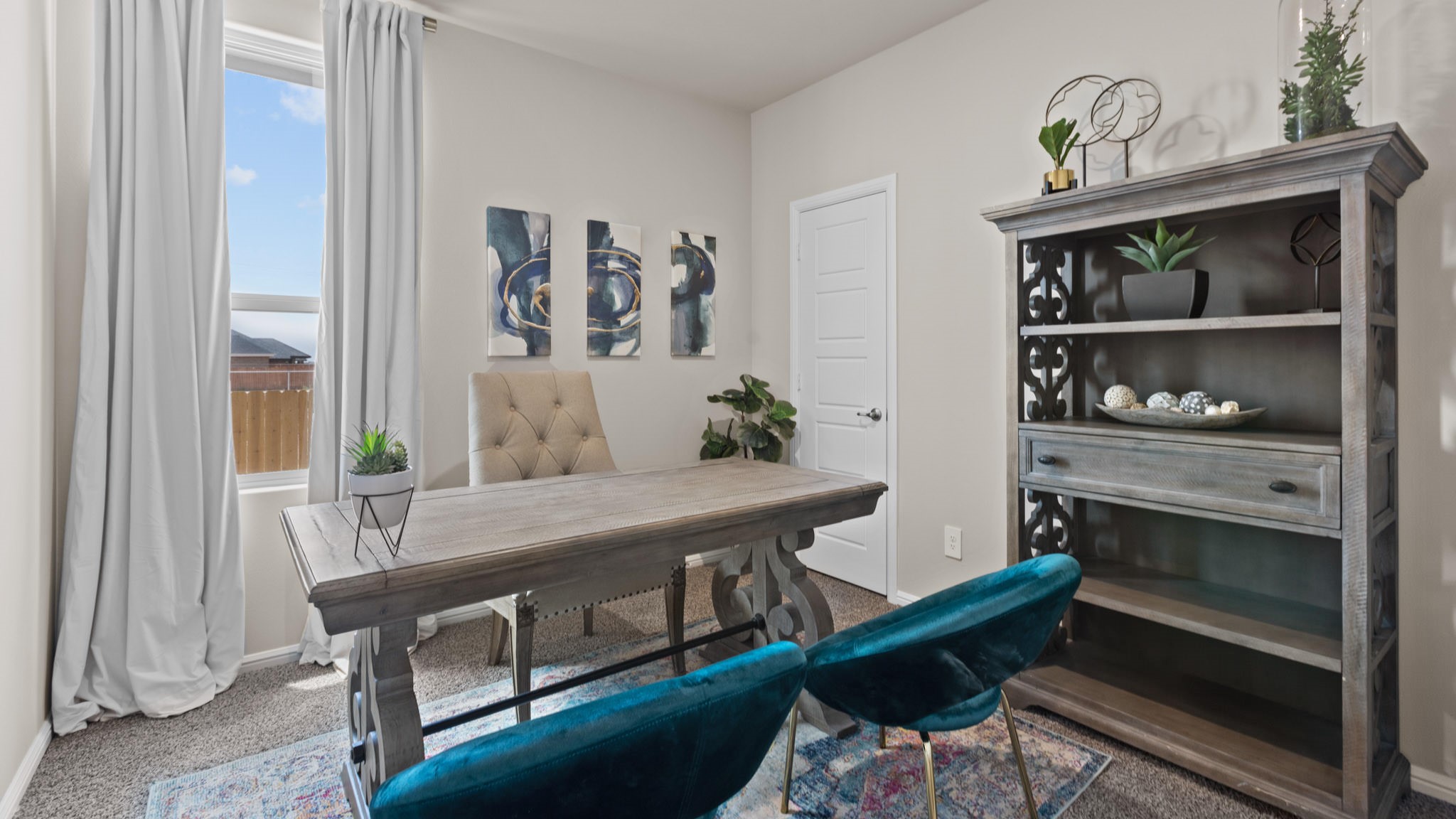 Guest bedroom 2 with side window and plush carpet floor