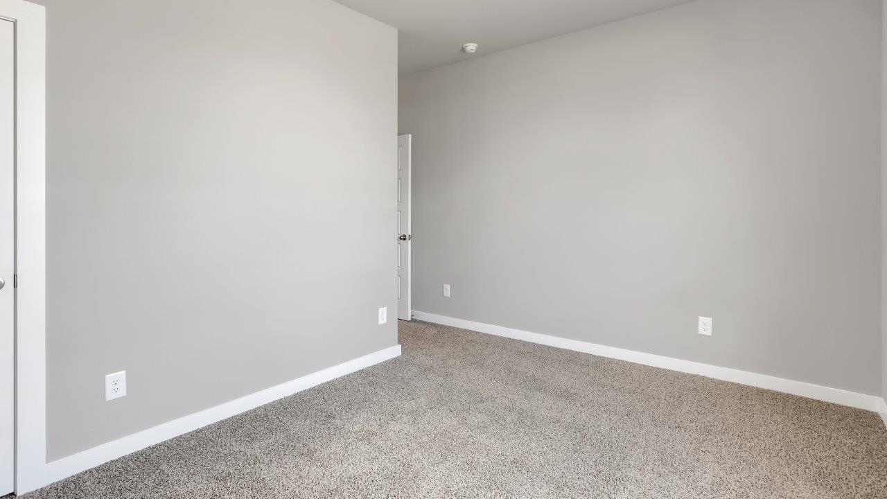 Front guest bedroom with ample natural light
