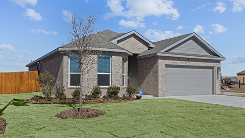 Exterior of single-story modern brick home with spacious front windows