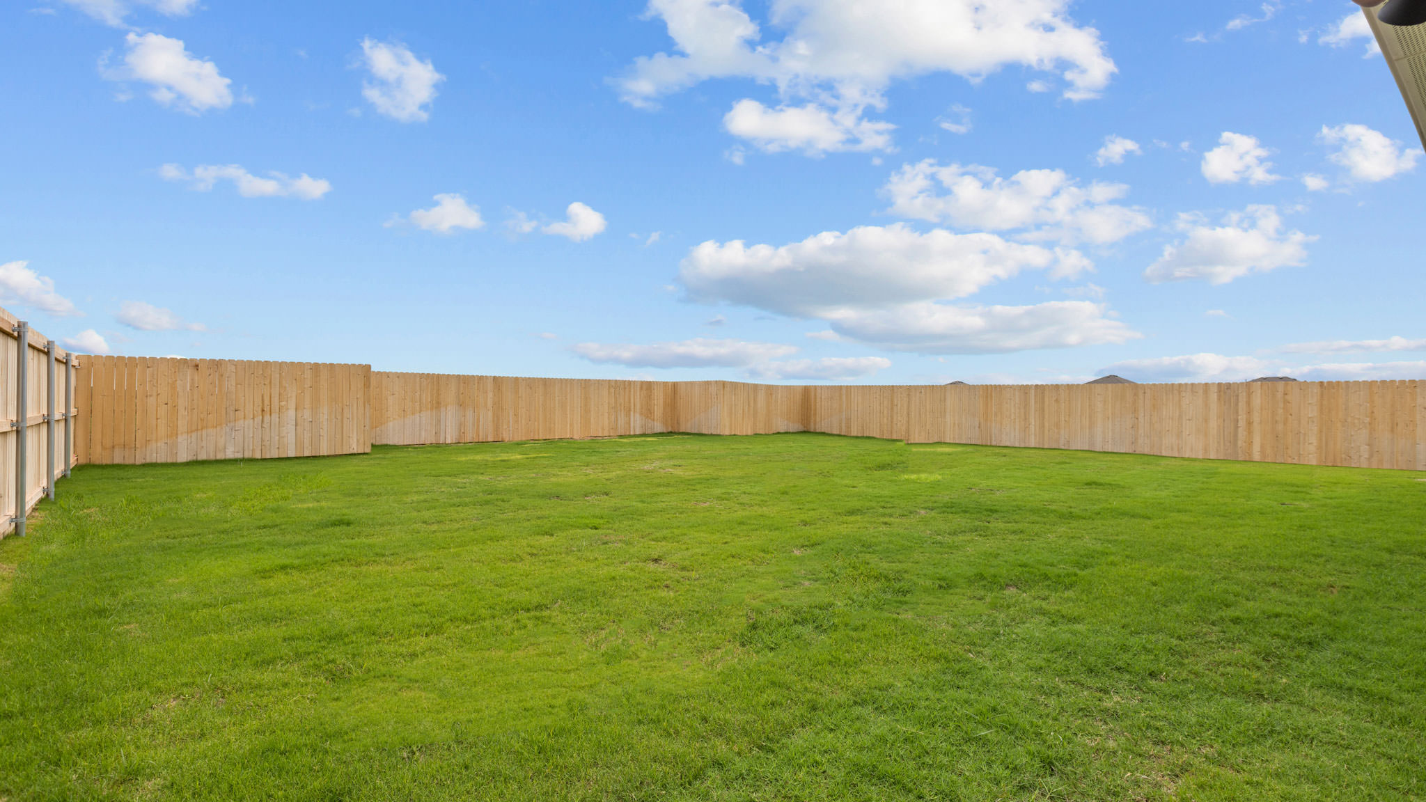 Private spacious fenced-in backyard