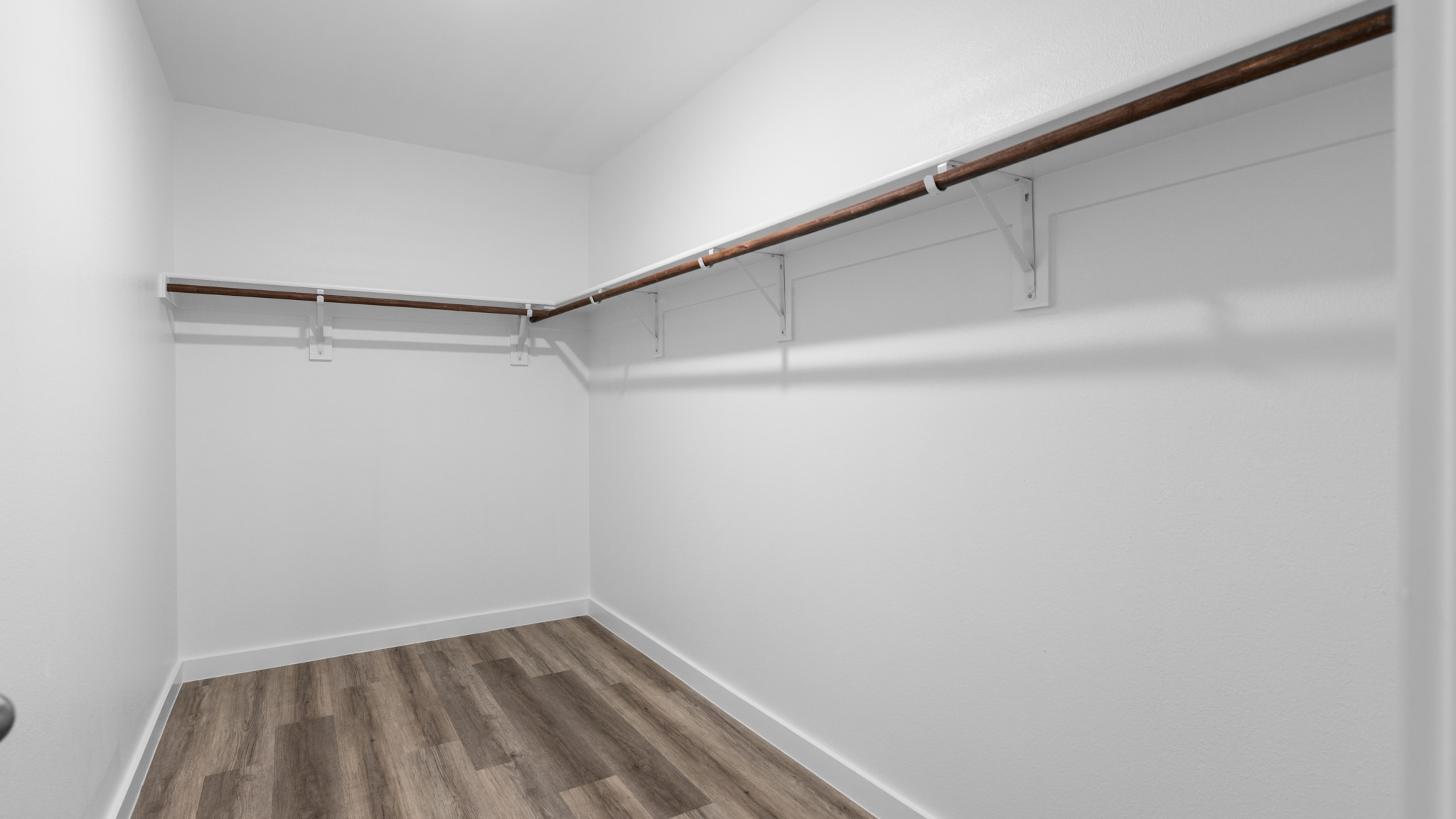 Primary walk-in closet with extra storage space