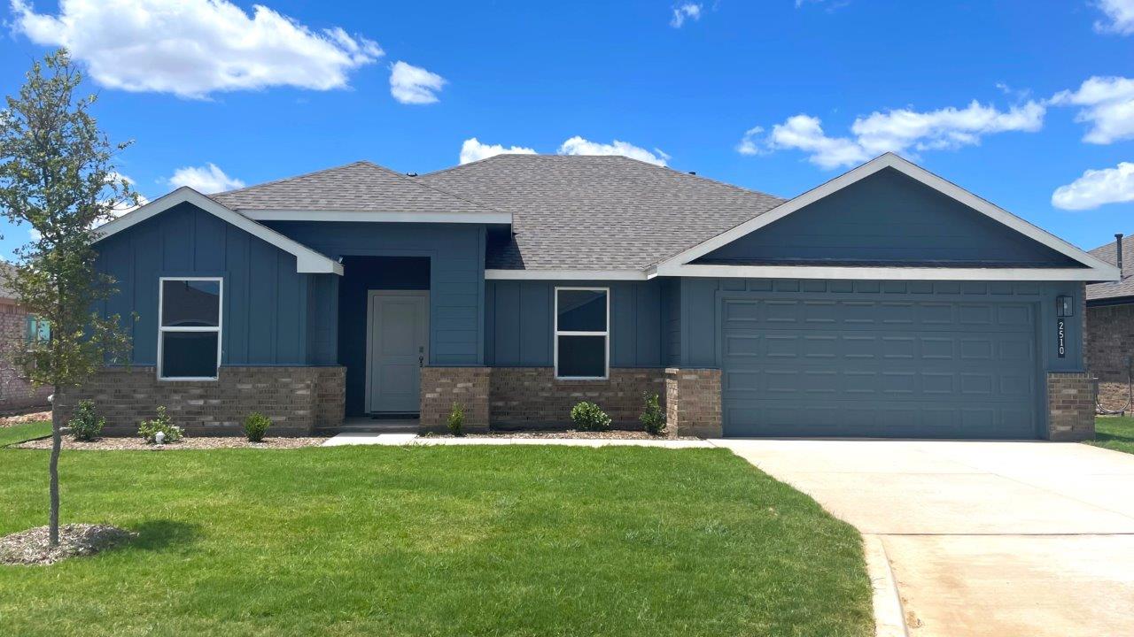 Exterior of single story modern farmhouse home