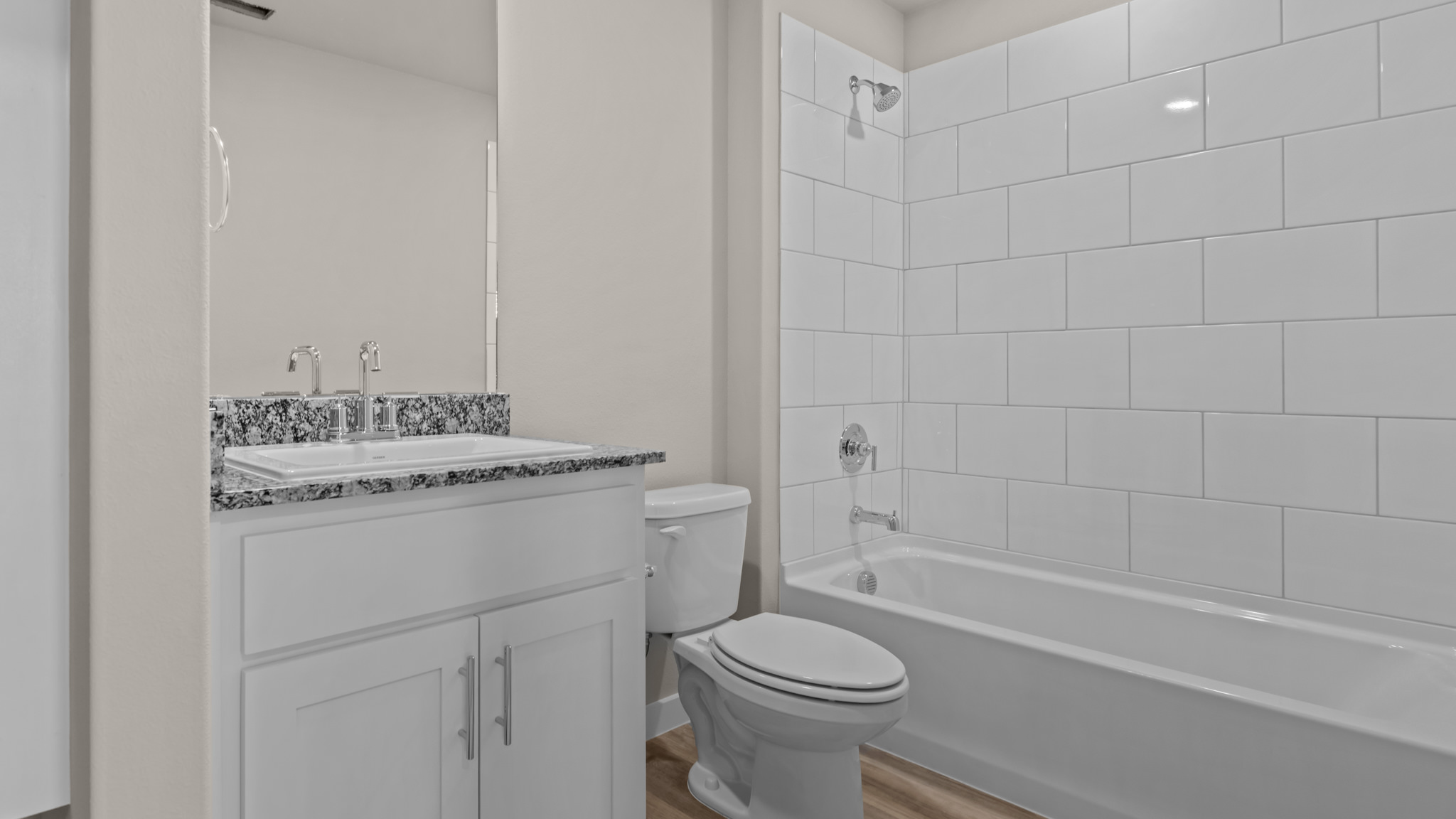 Guest bathroom located between guest bedrooms