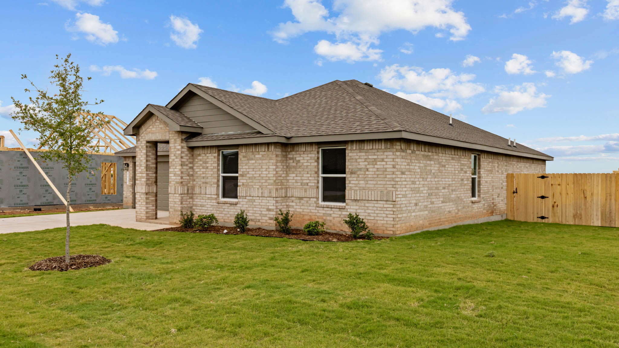 Single story classic brick home with front entry