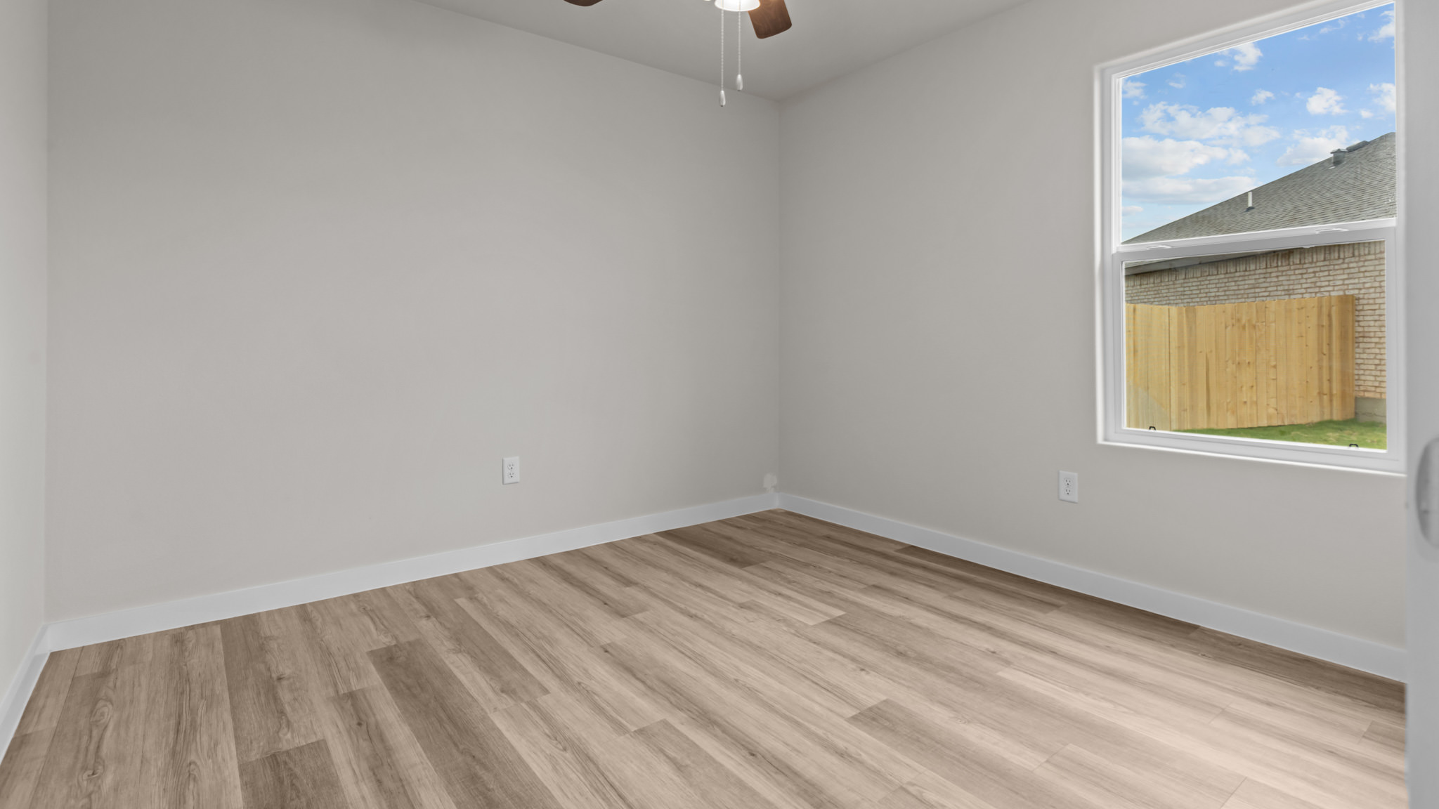 Guest bedroom 3 with plush carpet floors and spacious closet
