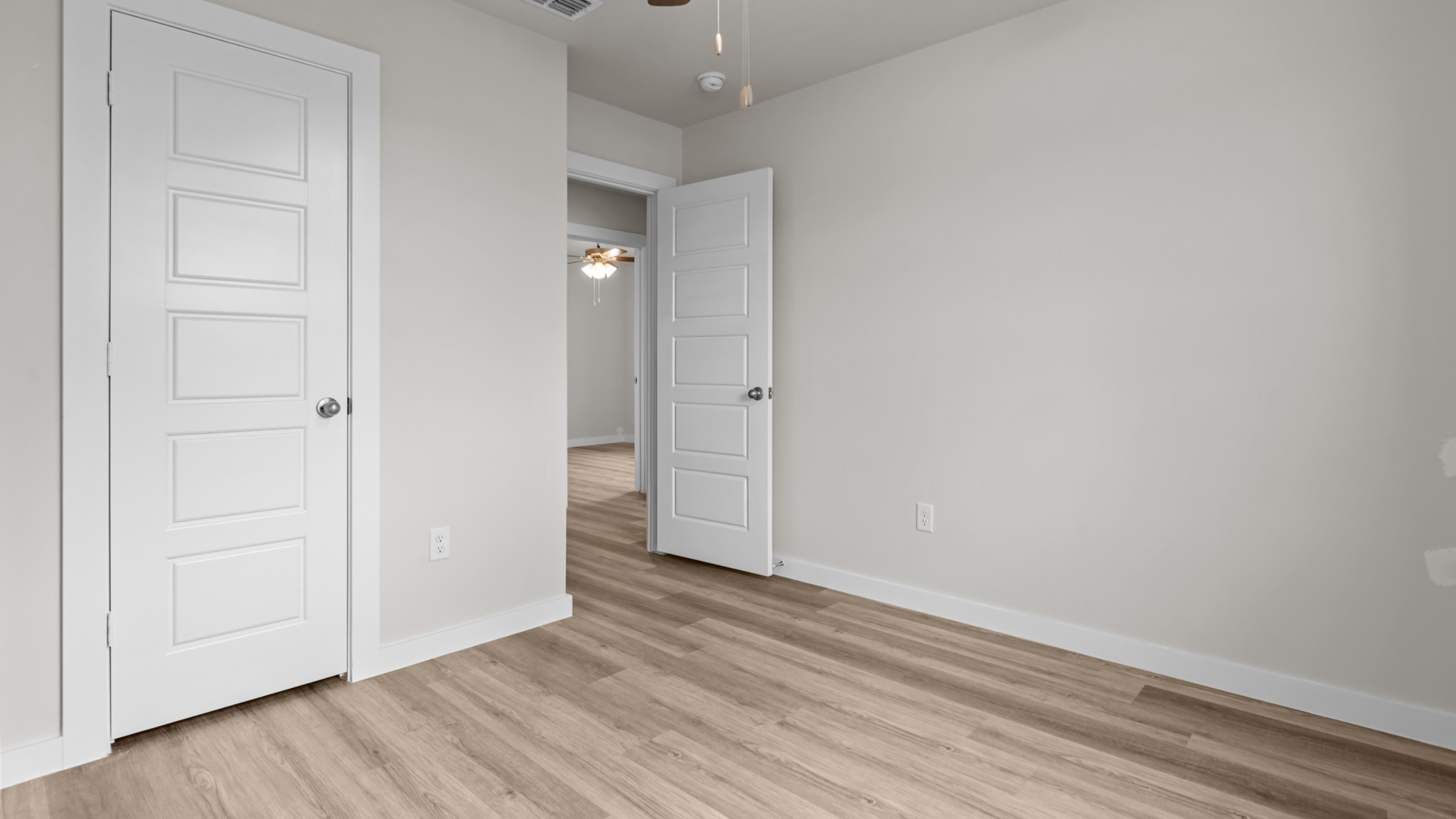 Guest bedroom 3 with plush carpet floors and spacious closet