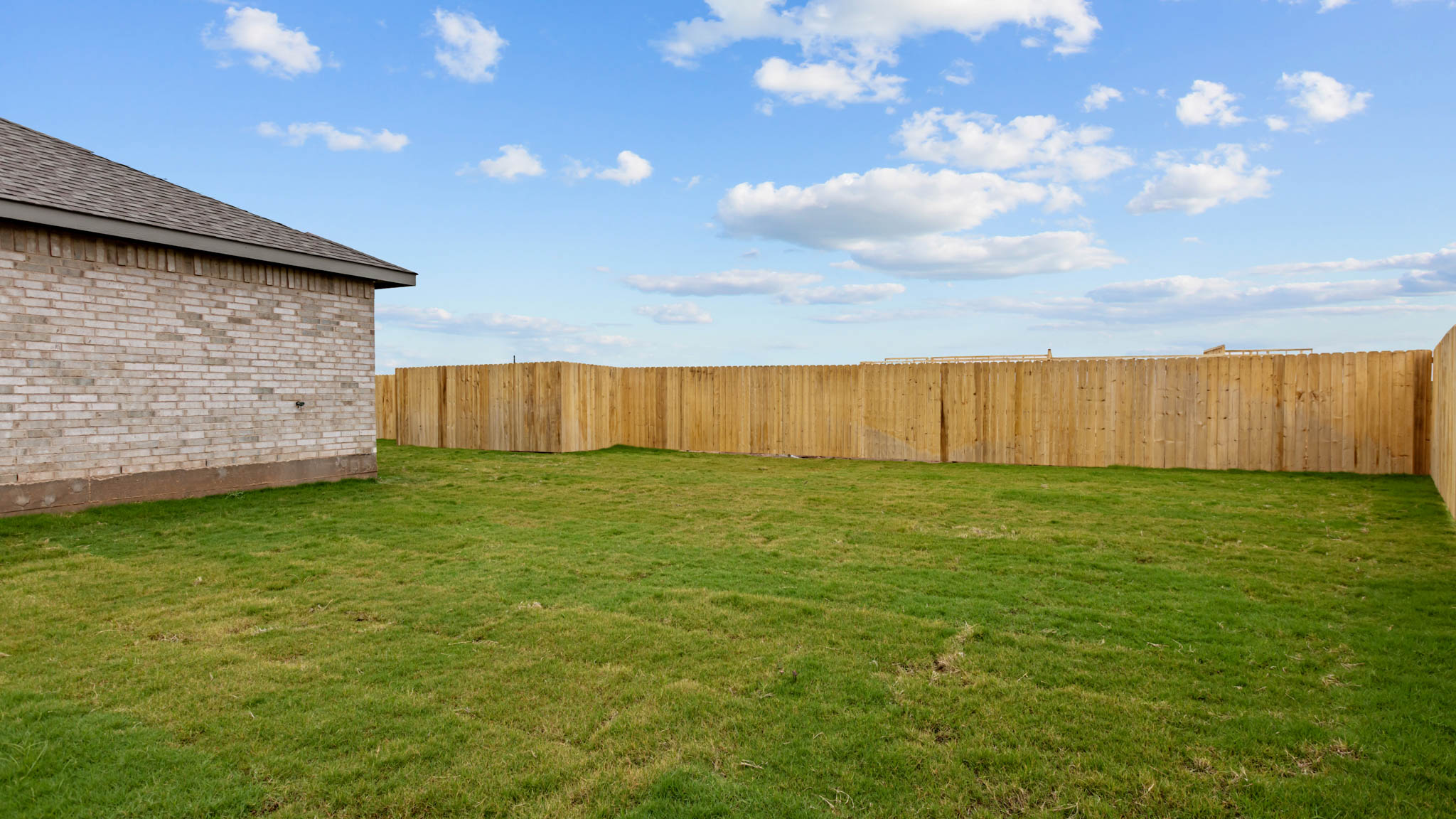 Private spacious fenced-in backyard