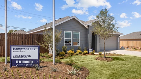 Side view of single-story modern farmhouse home with sturdy siding