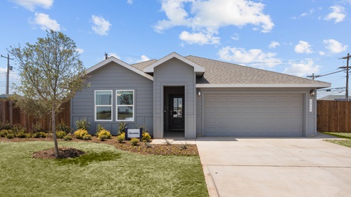 Exterior of single-story modern farmhouse home