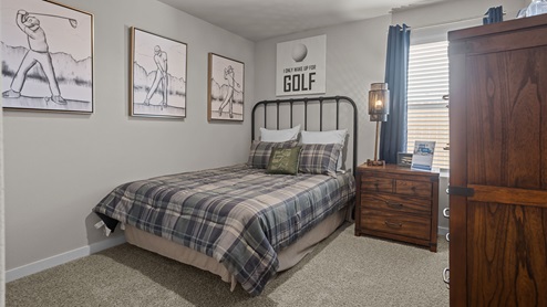 Guest bedroom 1 with front windows and ample natural light