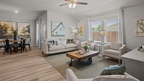 Open living and family room area with ample natural light