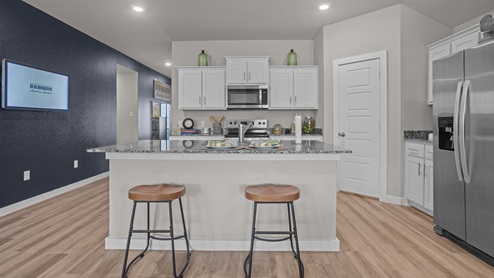 Spacious open kitchen overlooking family and living space
