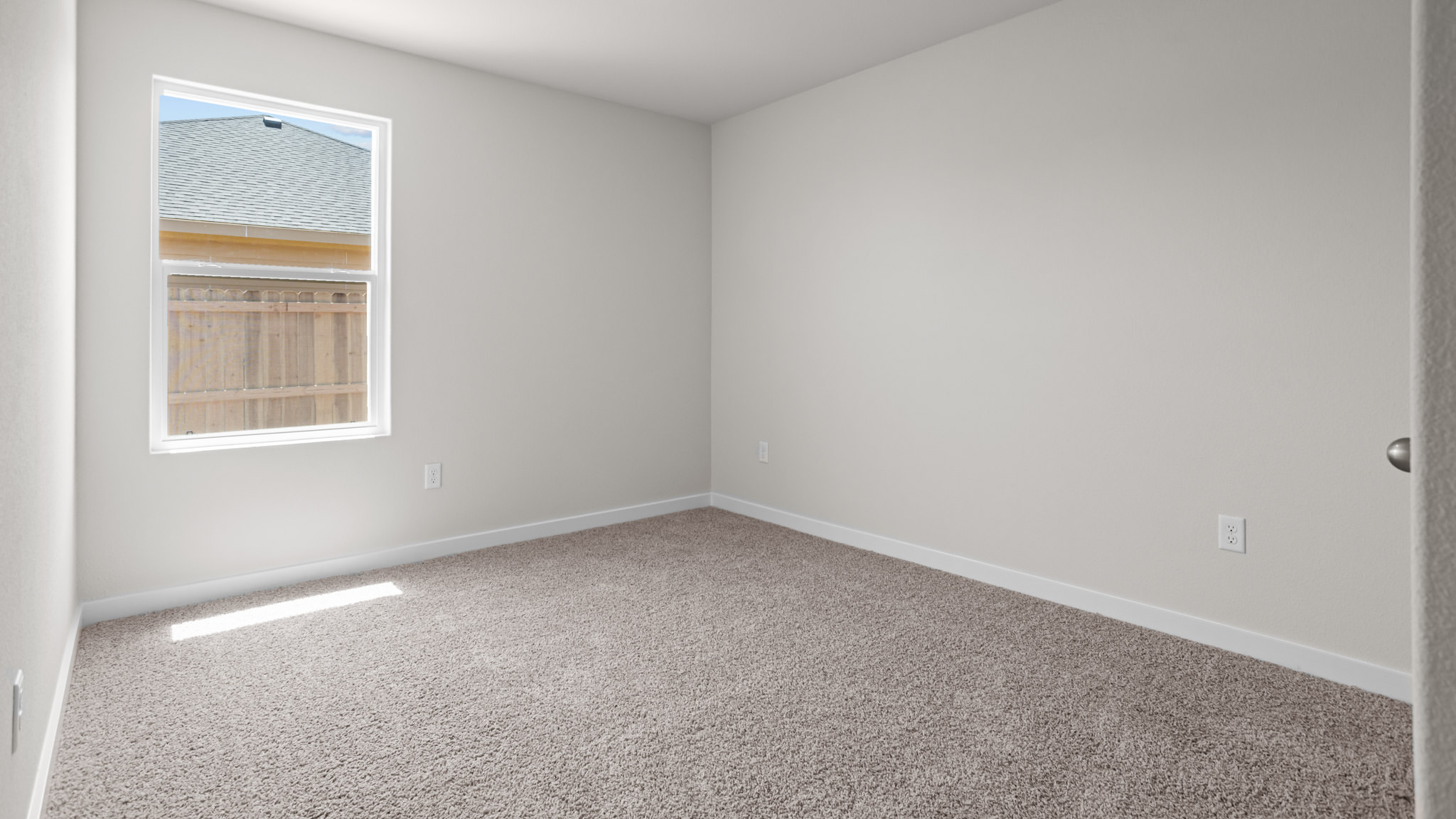 Guest bedroom 3 with plush carpet floors and spacious closet
