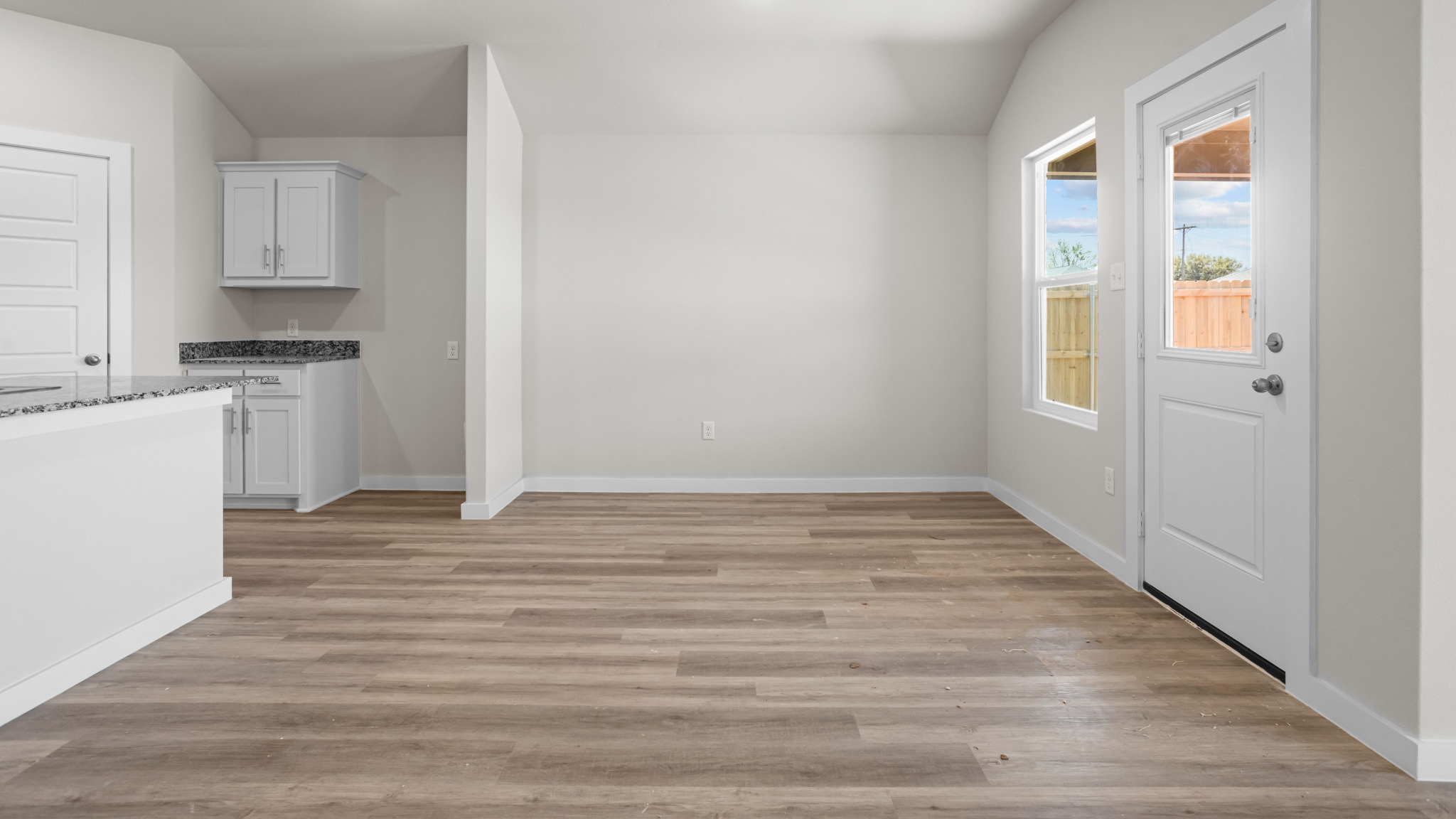 Open dining room space adjacent to kitchen
