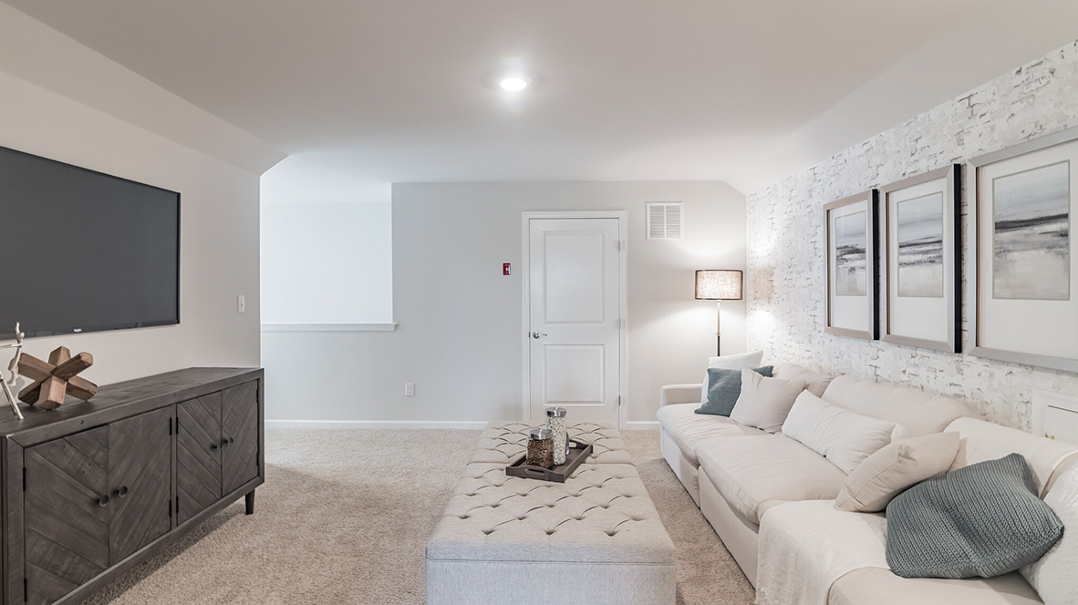 The Bristol plan includes a cozy loft area upstairs.