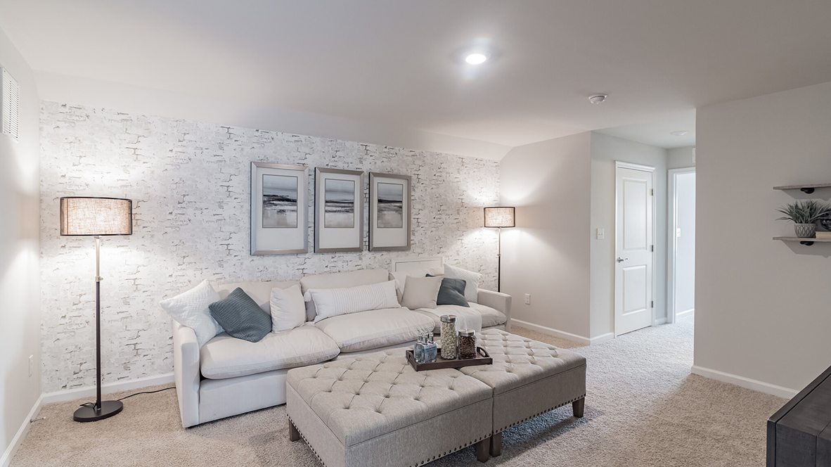 The Bristol plan includes a cozy loft area upstairs.