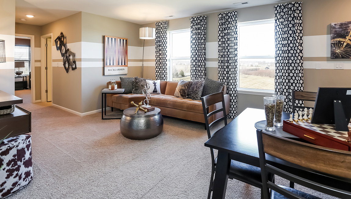 Different view of the cozy loft area upstairs that the Clifton plan includes.