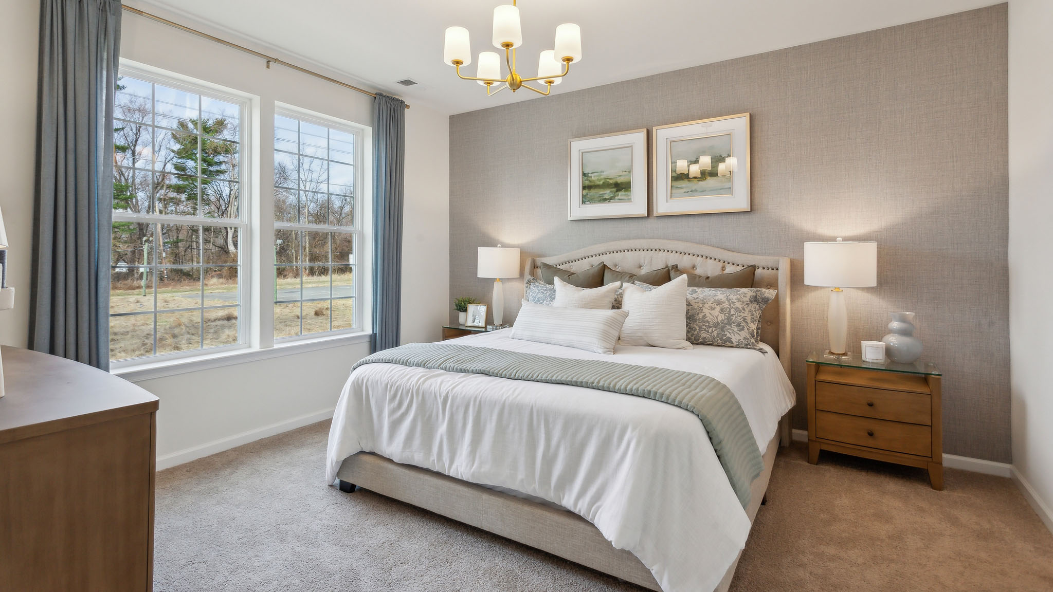 The primary bedroom has a large double window.