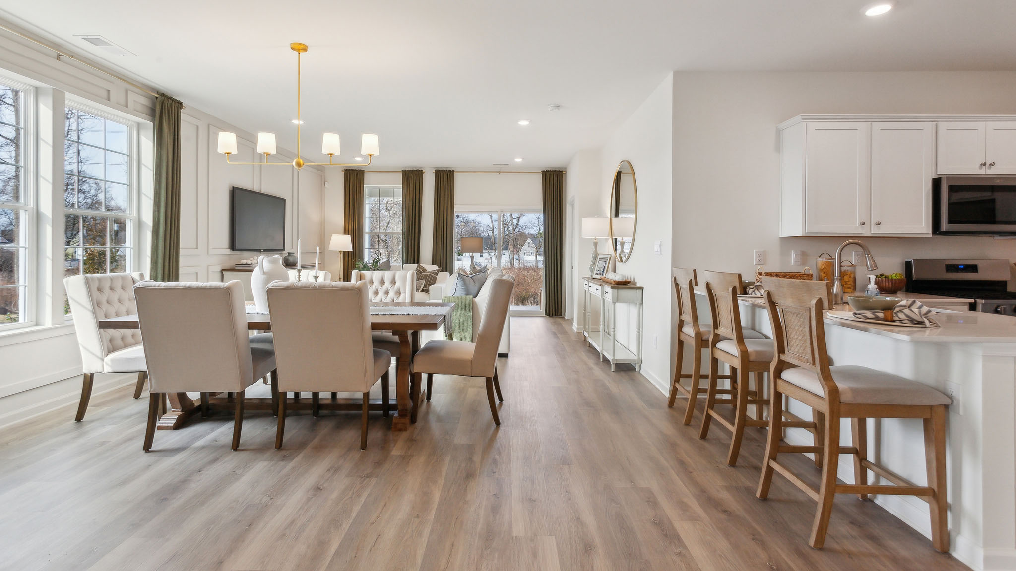spacious kitchen with white cabinets