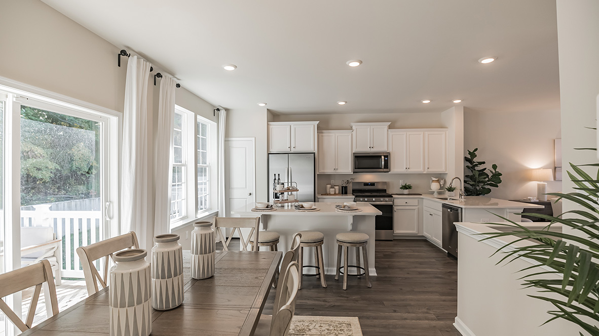 Spacious dining area flows into the kitchen area.