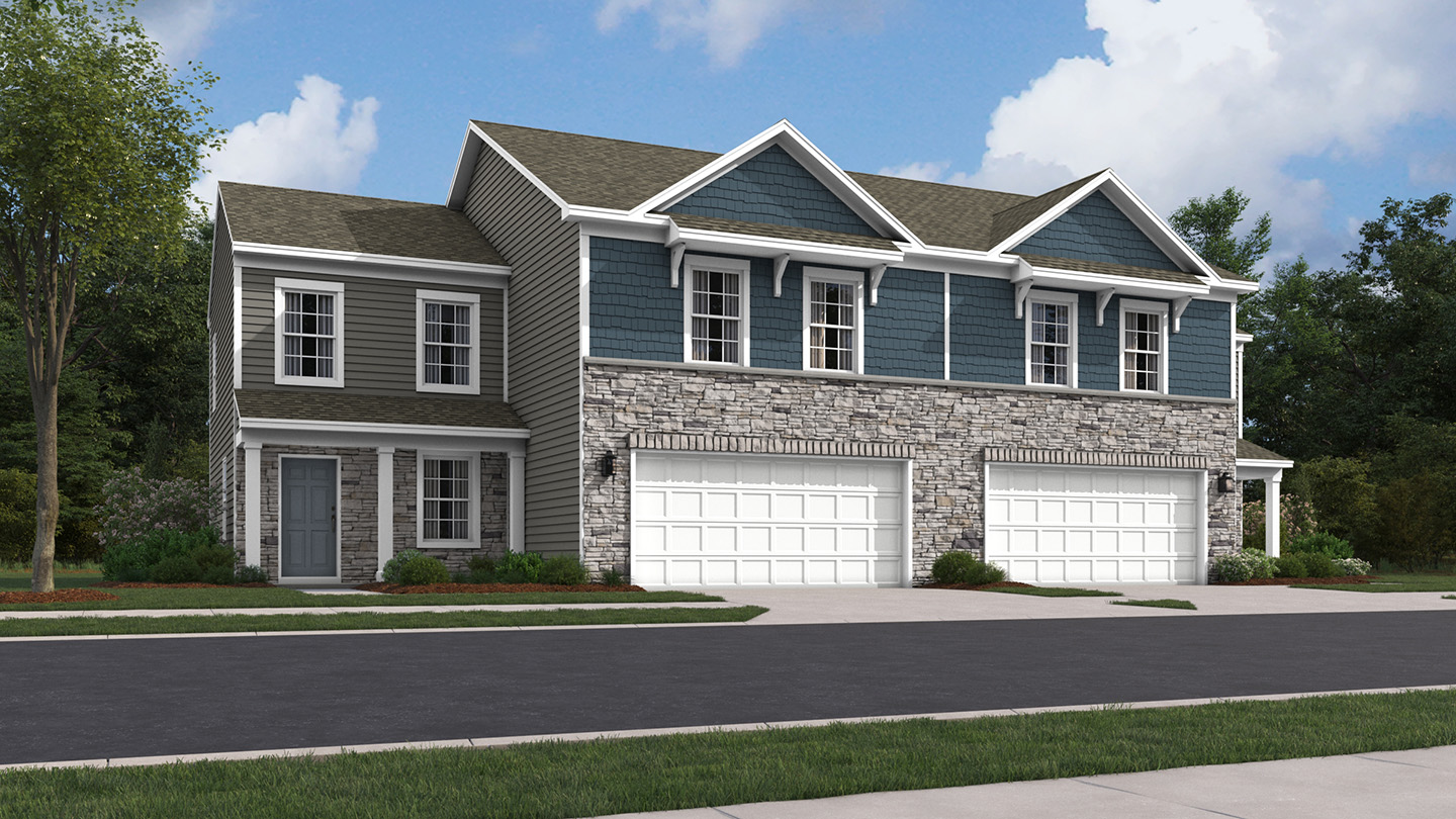 Derby Twin two story home exterior with navy blue and stone work and white 2 car garage