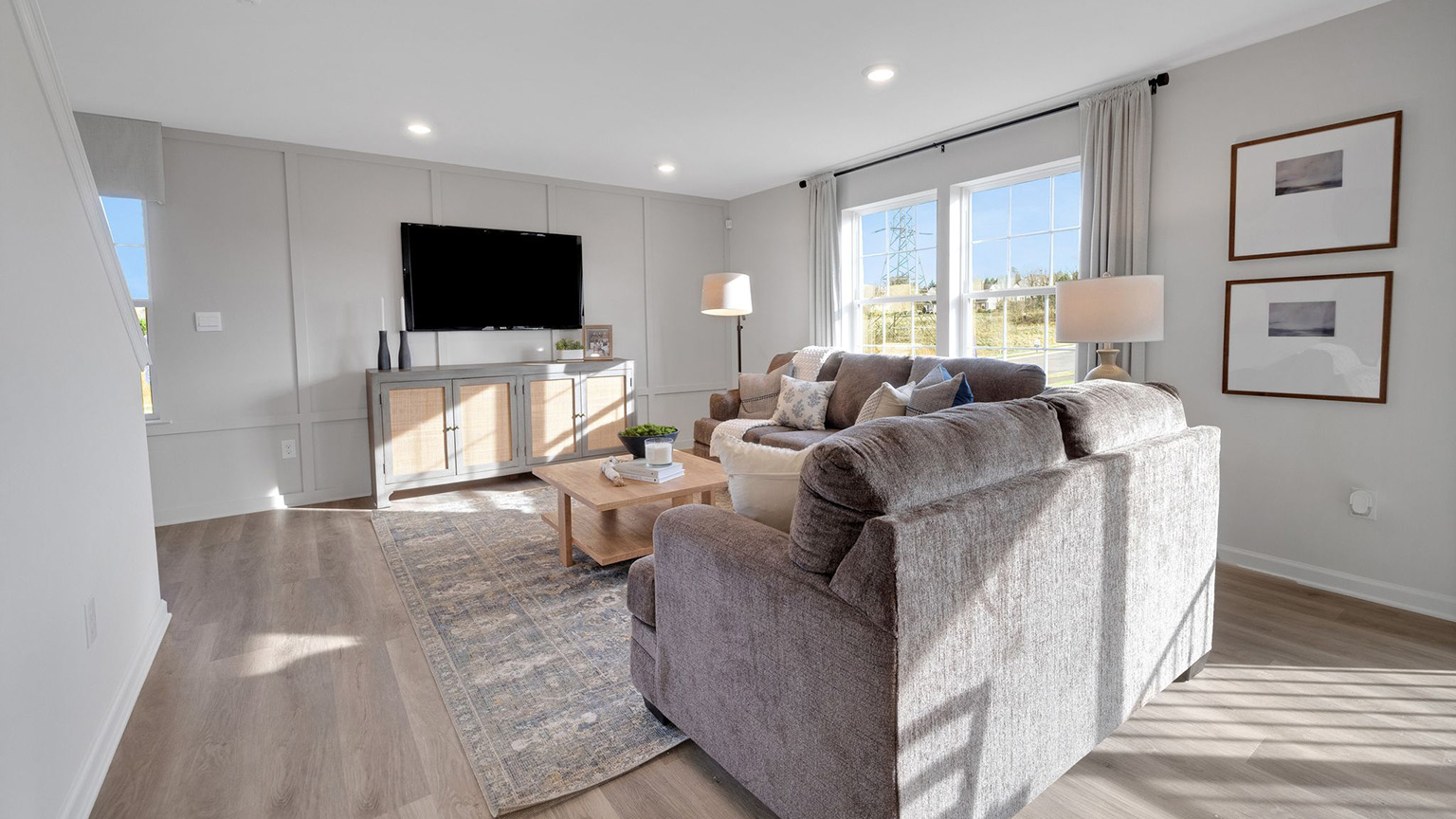 Large living area with plenty of natural light.
