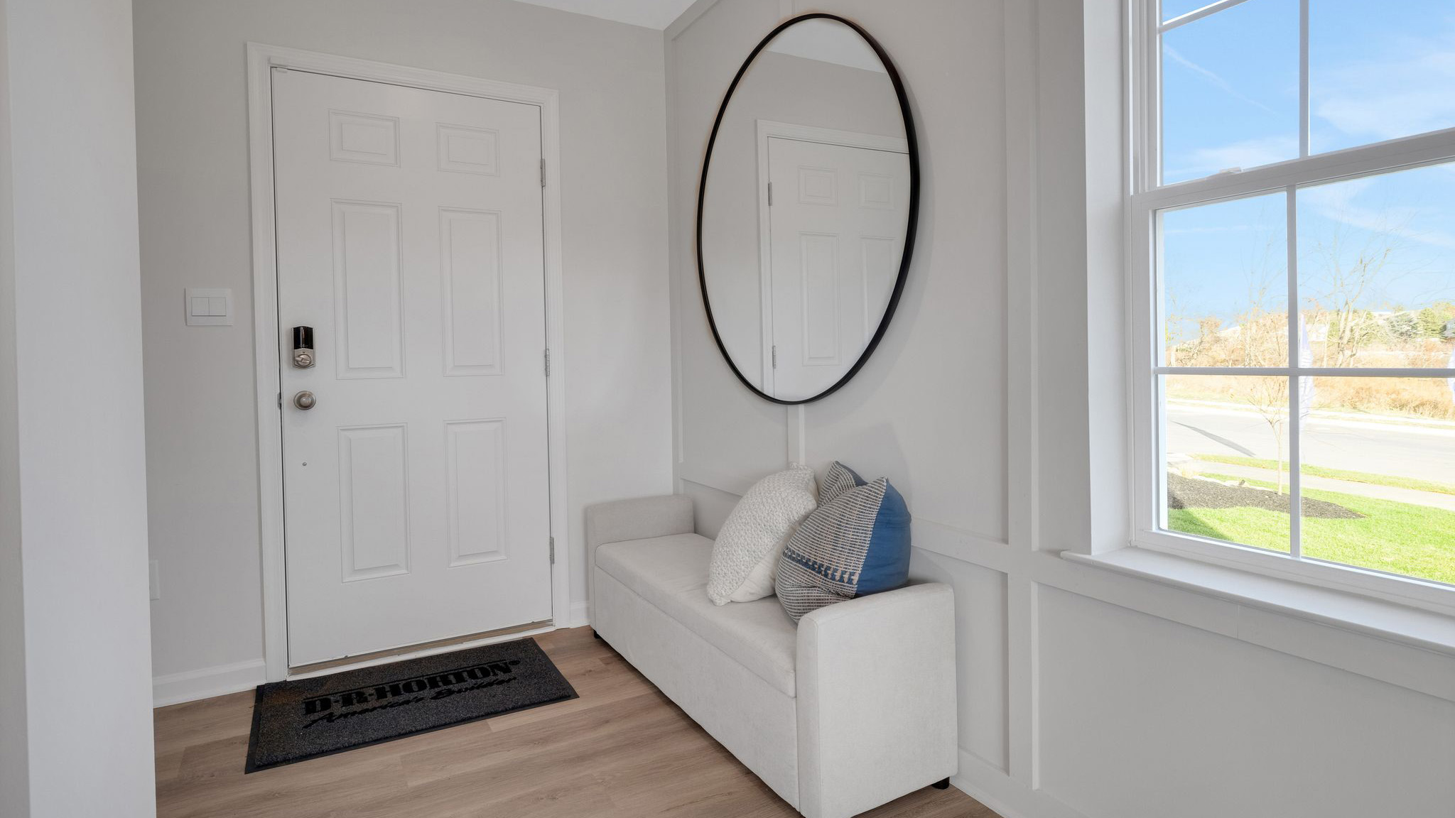 A welcoming foyer greets you as you enter this two-story home.