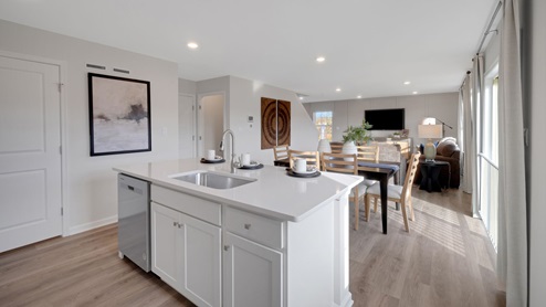 The spacious kitchen has a large island.