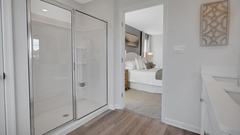 A private primary bathroom completes the owner's suite.