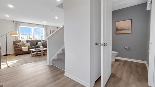 The first floor also offers a powder room.