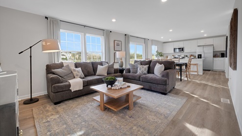 Large living area with plenty of natural light.