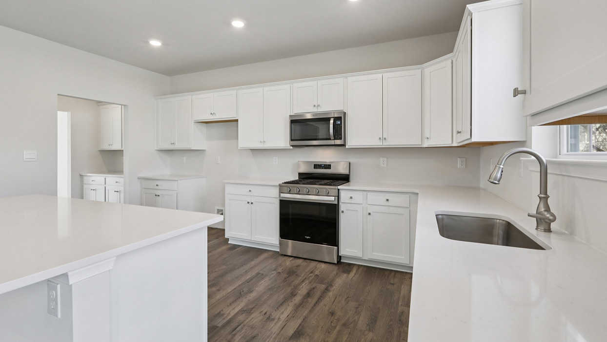 Kitchen with white cabinets