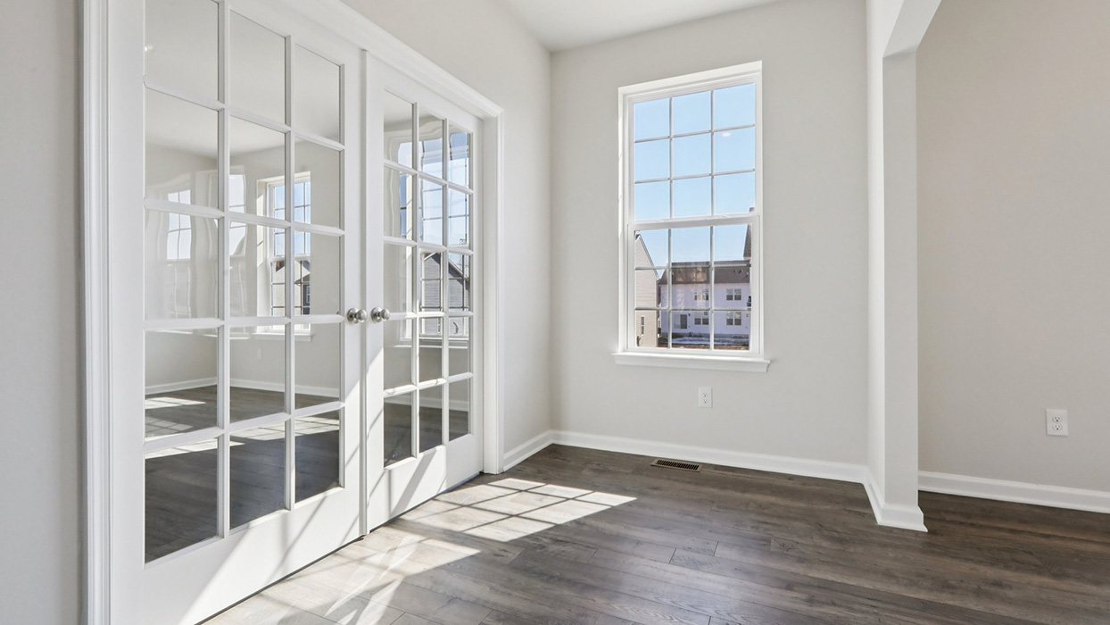 Outside the study flex room on main floor living with french doors closed