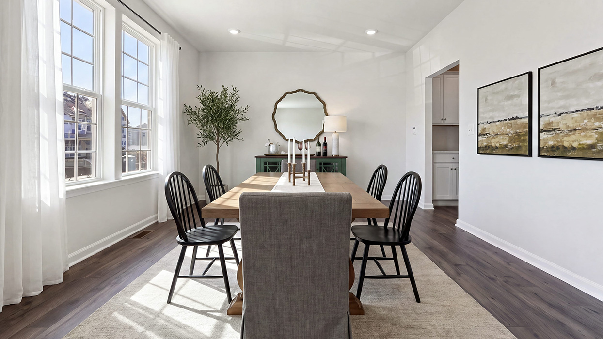 Formal dining with two large windows