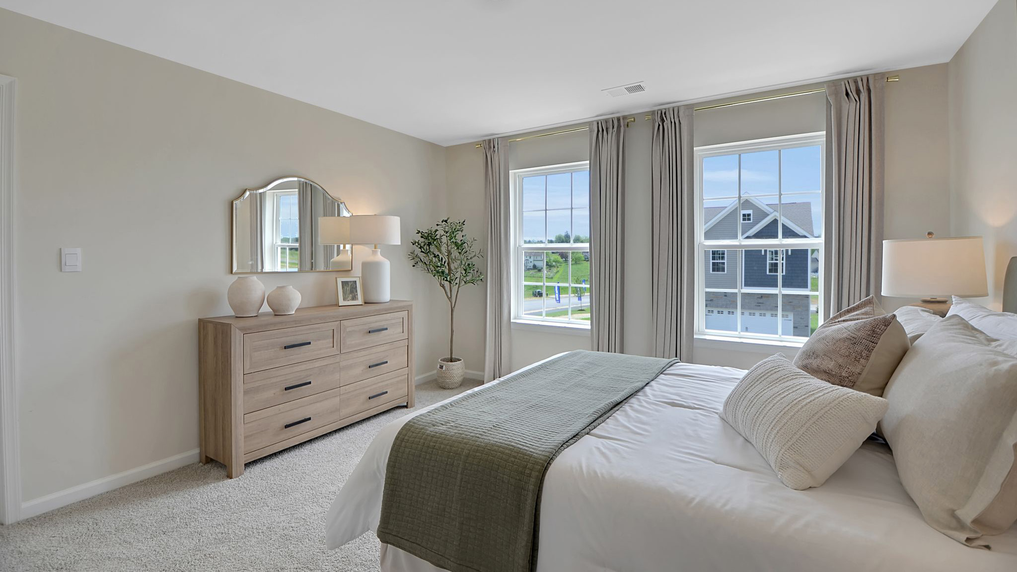 Bedroom with two single windows.