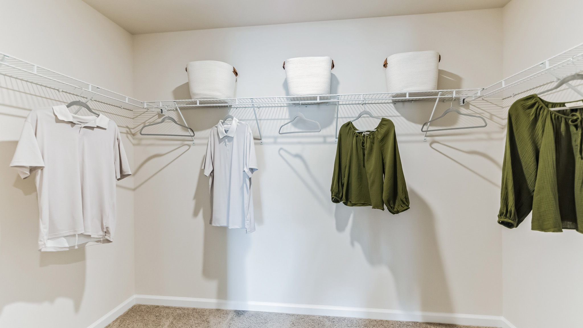 Large closet with racks and shelves.