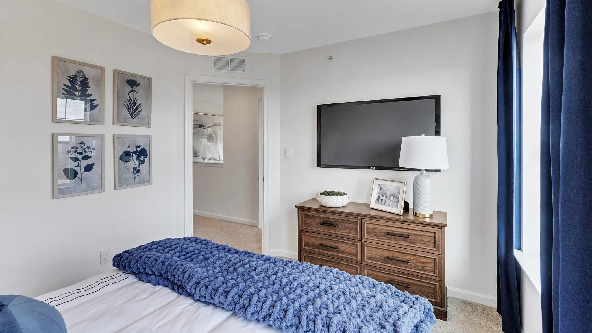 Bedroom three with a view into the hallway.
