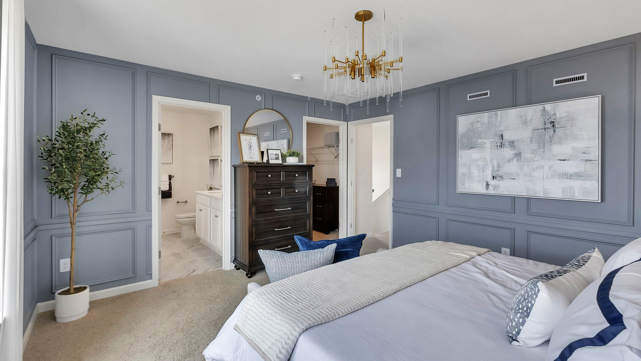 Primary bedroom with view towards the entrance to the room.