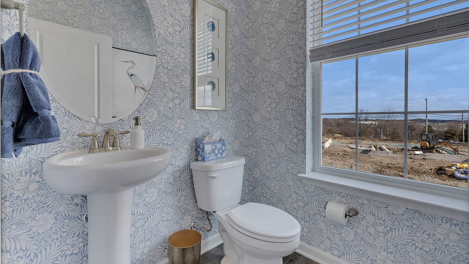 Half bath off of the living area with window.