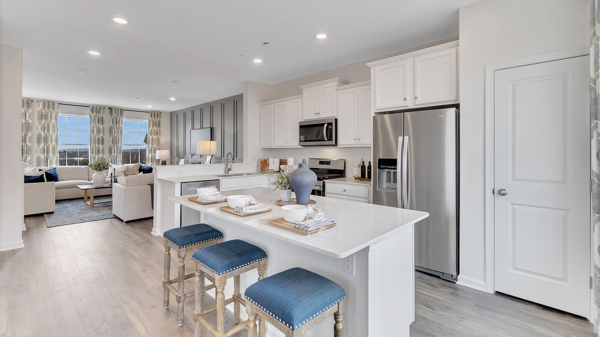 Kitchen area flows into the living area.