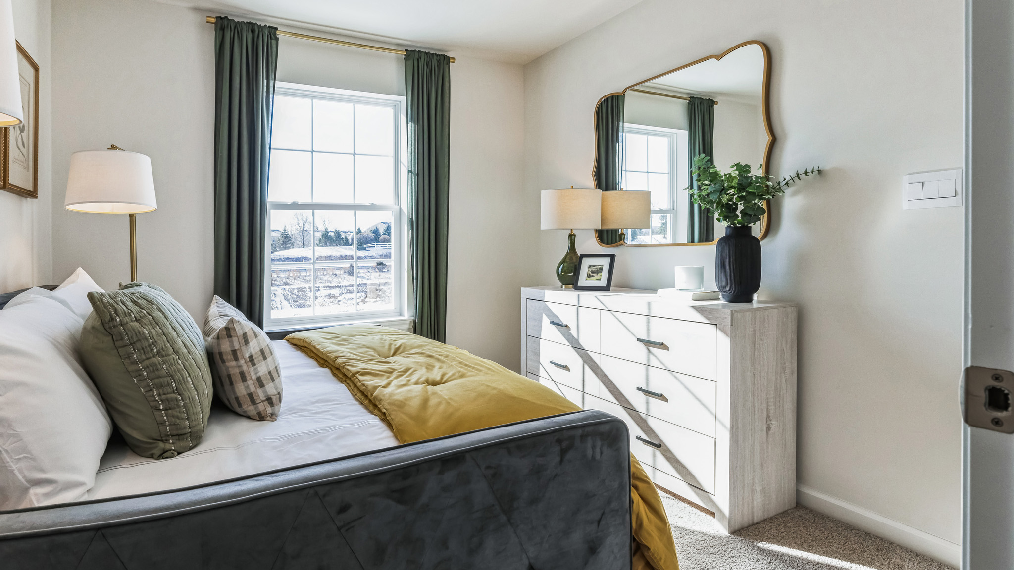 Bedroom two with a pull-out bed and a single window.