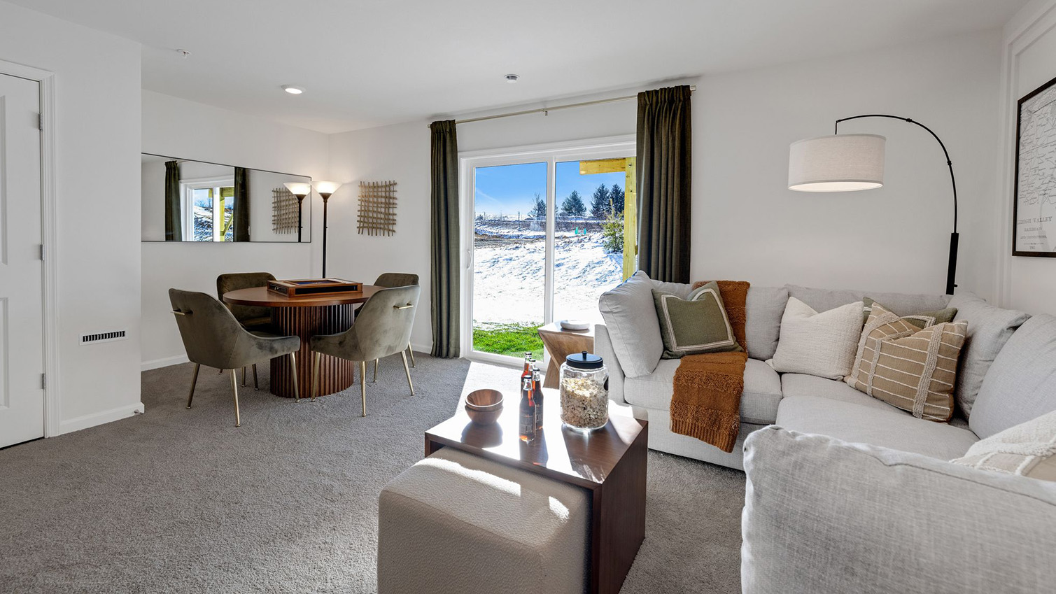 The finished recreation room with sliding glass door.