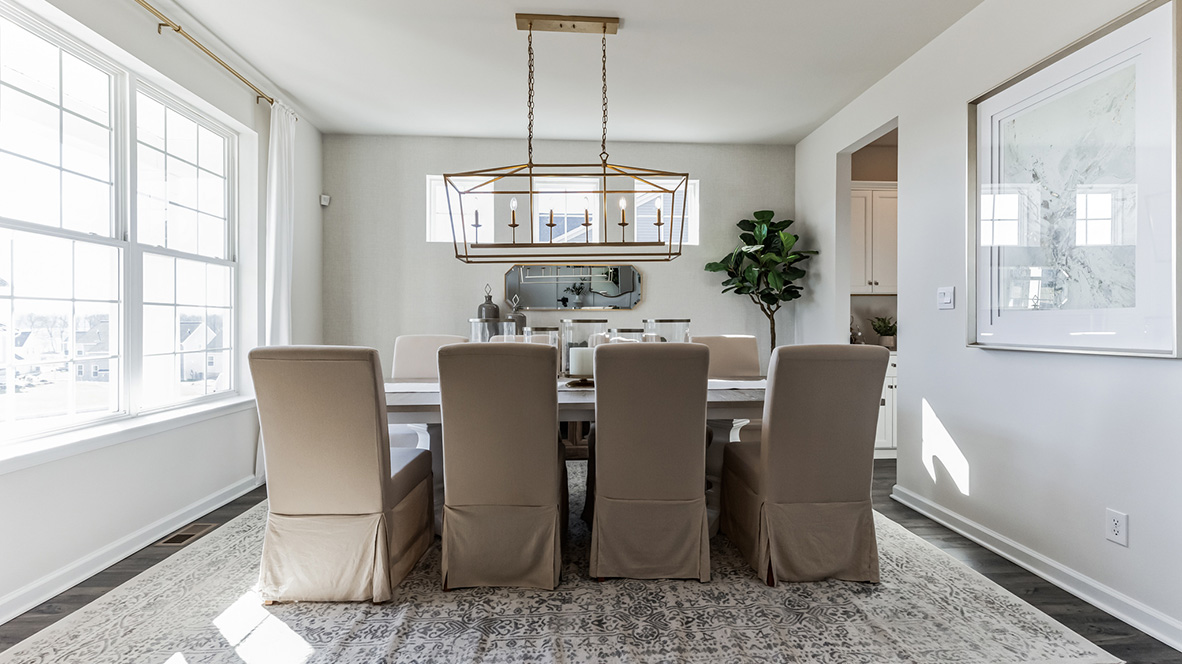 Elegant dining room with a large double window to the front yard.