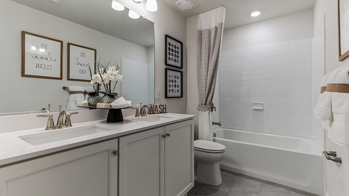 Third bedroom with large double window overlooking the front yard from the second floor.