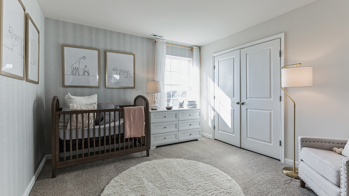 Second bedroom with single window next to the double door closet.