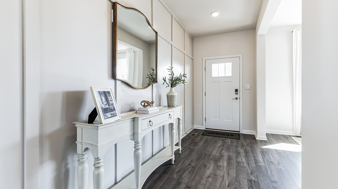 Entrance to the foyer with the dining room to the right.