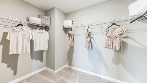 Walk in closet with room for storage.