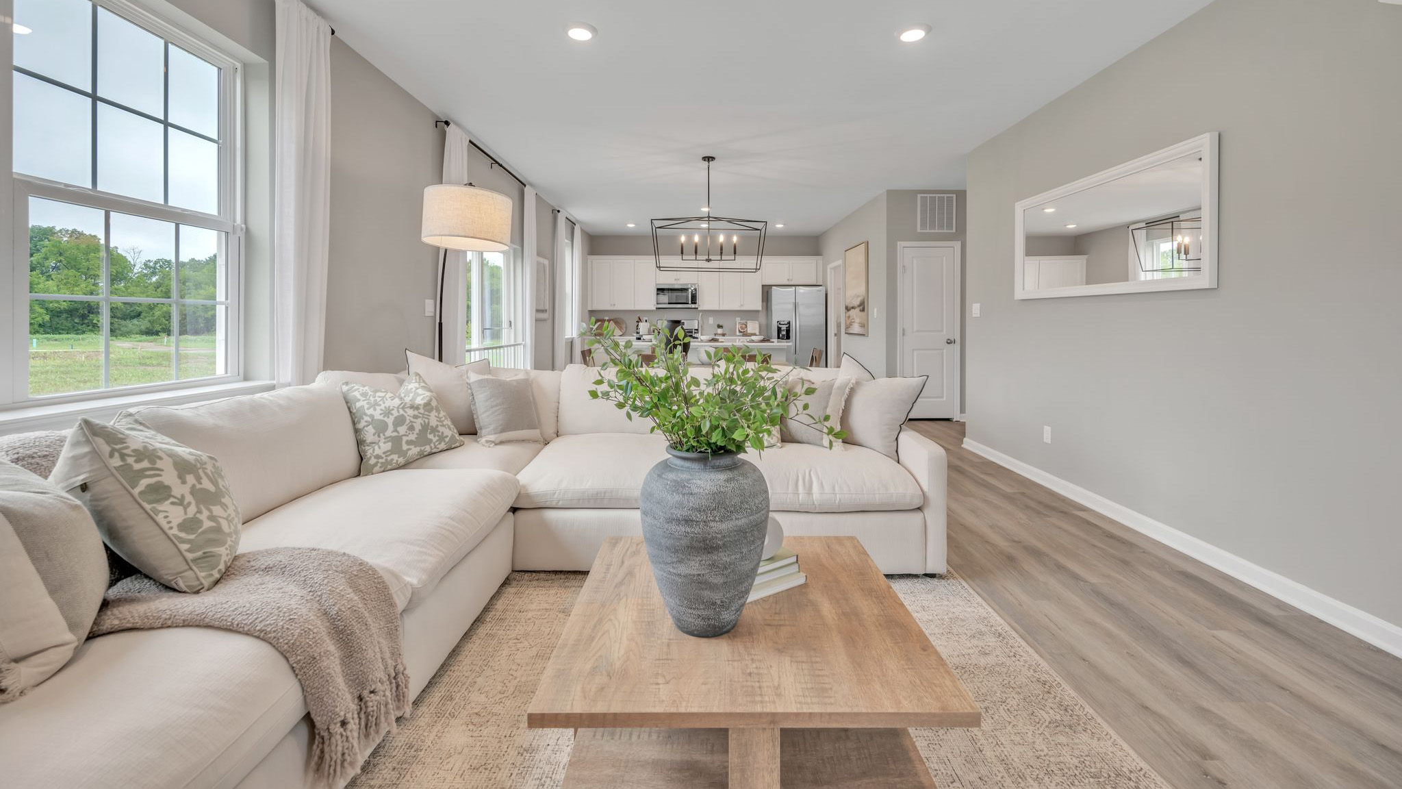 Galen open-concept living, dining and kitchen.