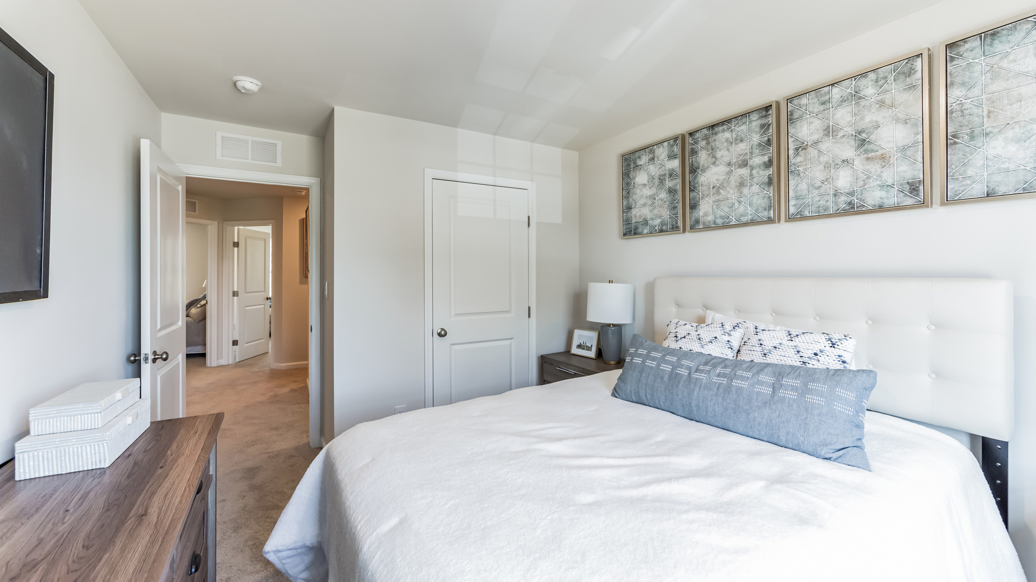 Another guest bedroom with view back towards the closet.